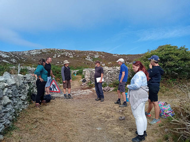 Trainer introducing drystone walling activities