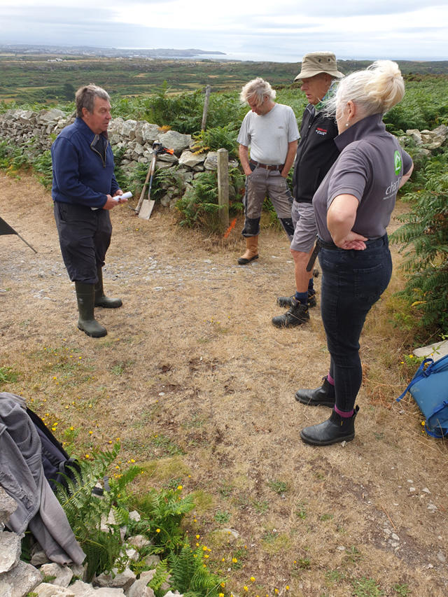 Volunteers being given instruction by Kehoe Countryside