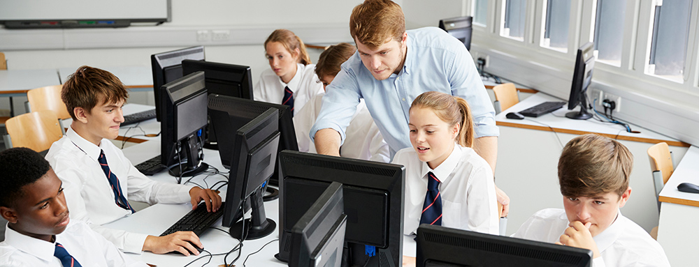 Teacher in computer class