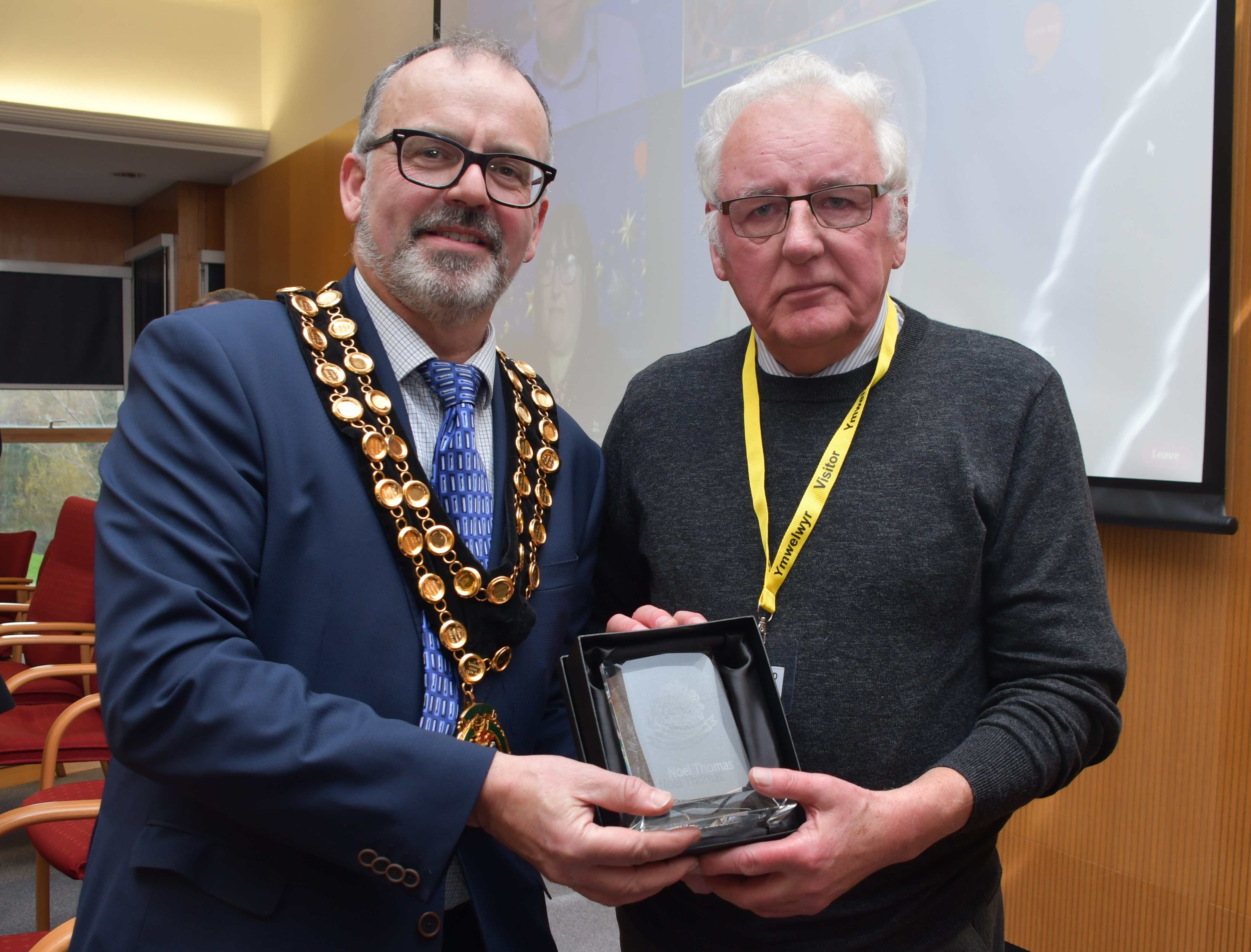 Noel Thomas being presented with an honour