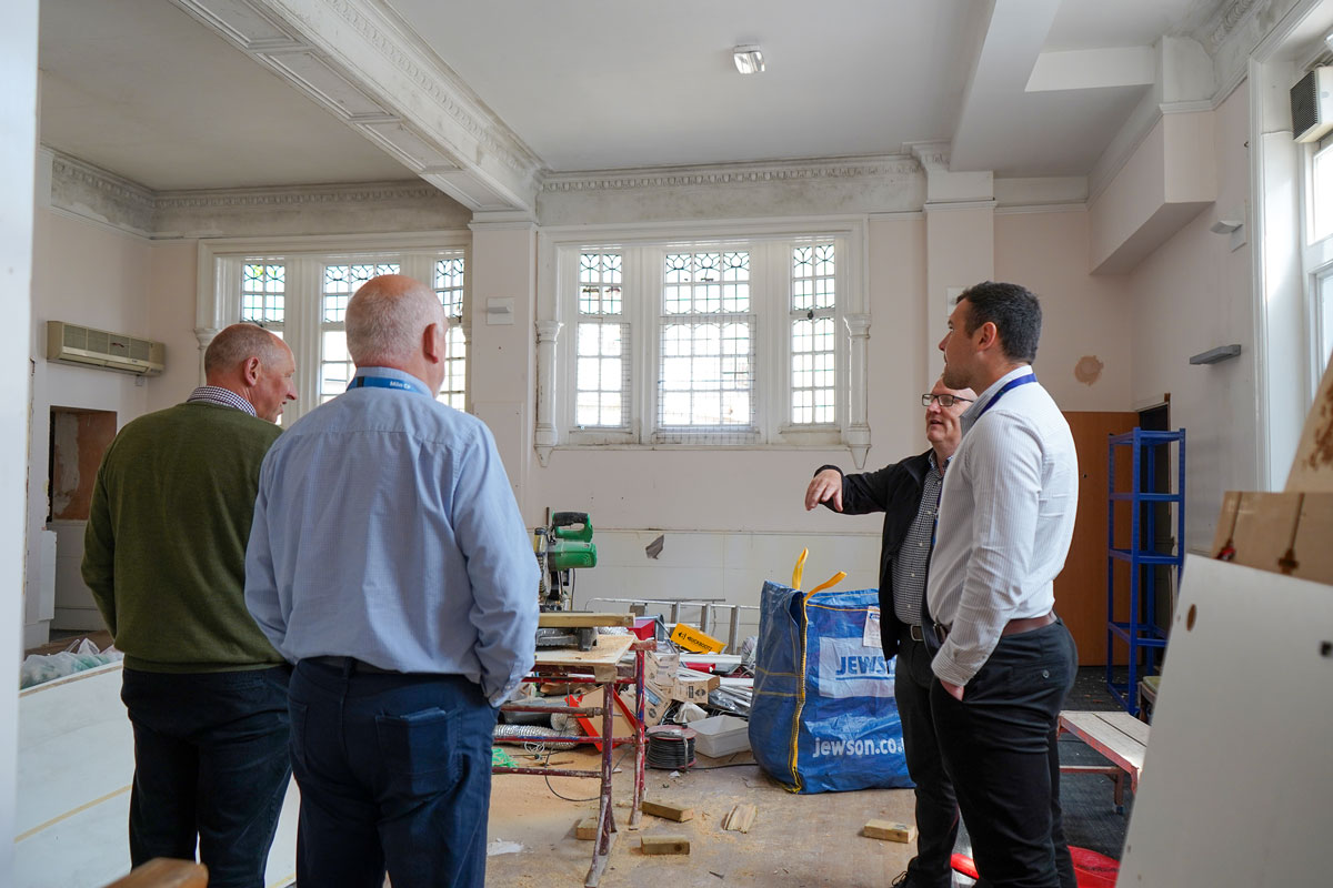 Officials inside the former bank