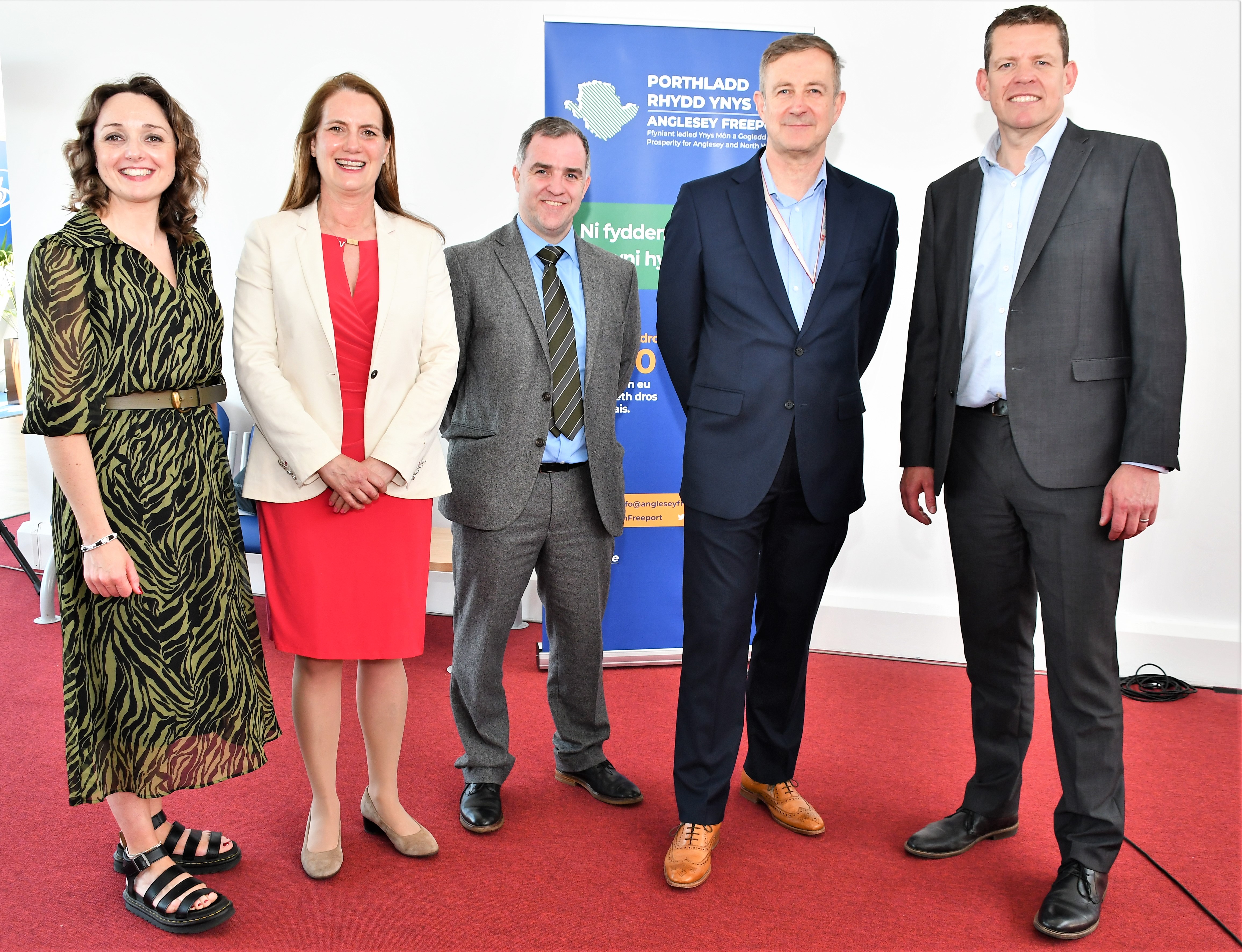A group photograph of Anglesey council staff and Senedd member at the Freeport launch