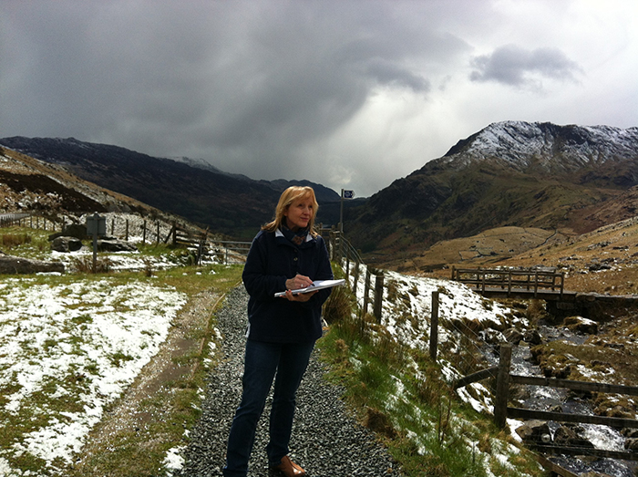 Image of Jane Paice sketching outside