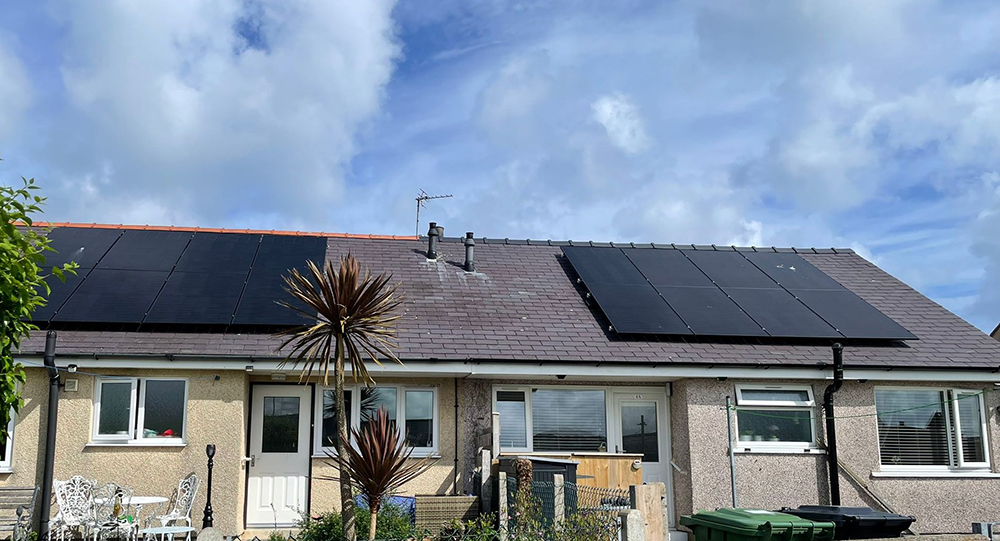 Solar panels on the roofs of bungalows in Rhos Elin