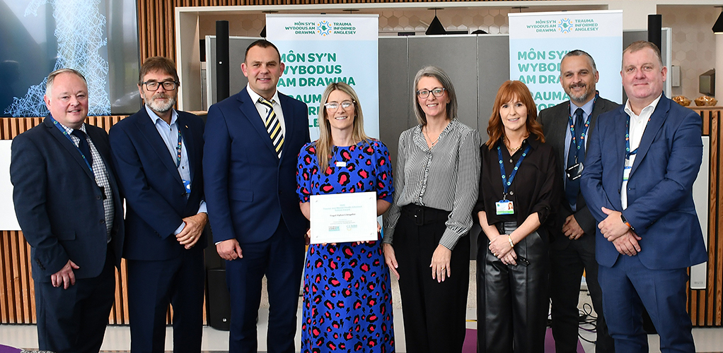 Headteacher Huw Davies accepted the award from Director of TISUK Cymru, Dr Coral Harper.